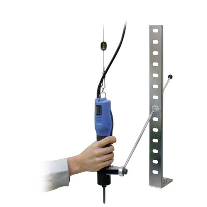 Hand using a tool to adjust a metal rack on a white background