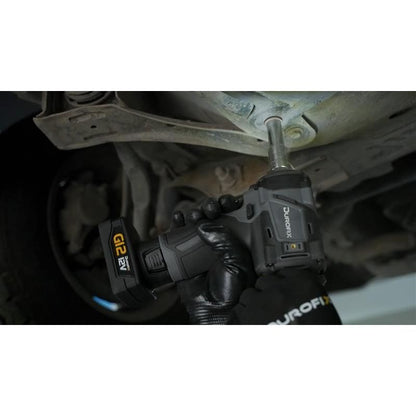 Person using a Durofix impact wrench on a mechanical component.