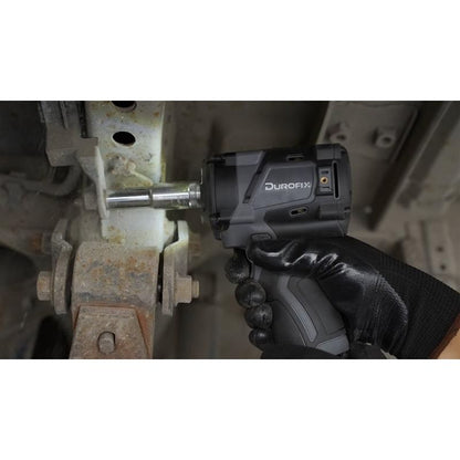 Person using a Durofix impact wrench on a mechanical component.