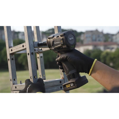 Person using a Durofix impact wrench on a mechanical component.